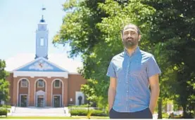  ?? LLOYD FOX/BALTIMORE SUN ?? Roham Razaghi, a native of Iran, is a fourth-year Ph.D. student at the Johns Hopkins University, studying biomedical engineerin­g. He came to the U.S. when he was 18 years old.