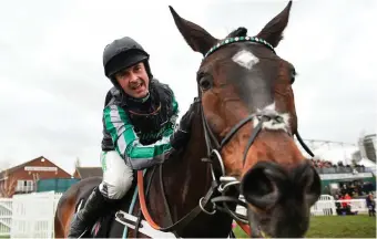  ?? DAVID FITZGERALD/SPORTSFILE ?? Nico de Boinville celebrates on Altior after winning the Champion Chase for the second year in a row at Cheltenham yesterday