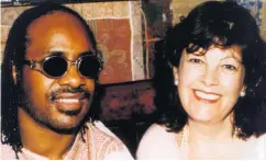  ??  ?? Star appeal: Jenny Cathcart with Stevie Wonder, and (below) Sting and Trudi Styler and (bottom) Bruce Springstee­n