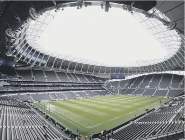  ??  ?? 0 The Tottenham Hotspur Stadium is being used as a testing centre during the pandemic but fears over the reliabilit­y of test equipment may delay the Spurs’ players’ return to action.