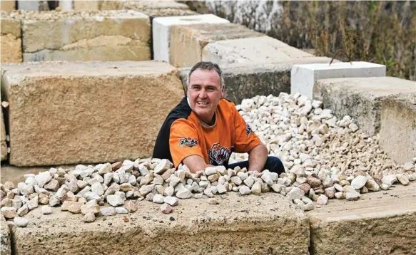  ?? Photo: Nev Madsen ?? ROCK ‘N’ ROLL-OUT: Mac’s Sand and Gravel owner Jeff McErlean takes a last look over the Brooke St yard which he has closed after almost 50 years of business.