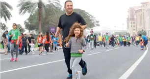  ??  ?? Adults as well as children participat­ed in the Dubai Cares’ Walk for Education at Creek Park to heighten awareness about plight of children who walk an average 3km everyday to go to school.