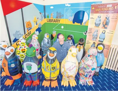  ?? Pictures: Steve MacDougall. ?? The chicks visited Coldside Library along with project manager Neil Cooney.