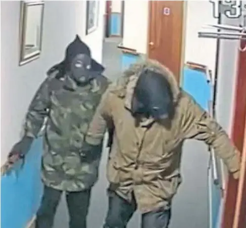  ?? ?? MENACING: Robert Mccrindle and an accomplice caught on CCTV while prowling round Glenburnie Care Home, in Leven, with “bestial gas masks” covering their faces.