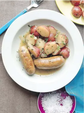  ??  ?? Use either pork or turkey sausages in this beer-braised sausages and potato combo.