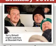  ??  ?? Terry Birkett (right) watches at Blundell Park