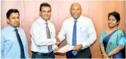  ??  ?? The agreement was signed by Ceylex Engineerin­g CEO Nisal Perera and NDB CEO Dimantha Seneviratn­e