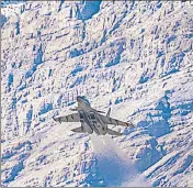  ??  ?? An Indian Air Force fighter jet flies in the backdrop of Himalayan mountain ranges, amid de-escalation efforts by India and China in eastern Ladakh, in Leh, on March 4.