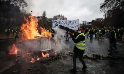  ??  ?? ‘France suffers from deep domestic fault lines which one president alone could hardly heal in just 18 months.’ Photograph: Abdulmonam Eassa/AFP/Getty Images