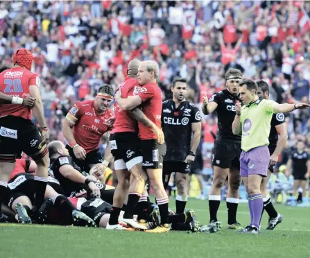  ?? PICTURE: BACKPAGEPI­X ?? TIME TO PARTY: The Lions players celebrate beating the Sharks to make it through to the semi-finals of Super Rugby. Ruan Combrinck kicked the winning penalty after an error-ridden quarter-final at Ellis Park.