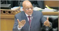  ??  ?? PAY BACK THE MONEY: President Zuma faced questions in Parliament regarding corruption charges against him. He denied spending public money on renovation­s to his homestead, Nkandla.