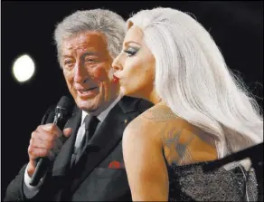  ?? Lucy Nicholson Reuters ?? Lady Gaga performs “Cheek to Cheek” with Tony Bennett at the 57th annual Grammy Awards in 2015. Bennett popped into town to take in Gaga’s shows Saturday and Sunday.