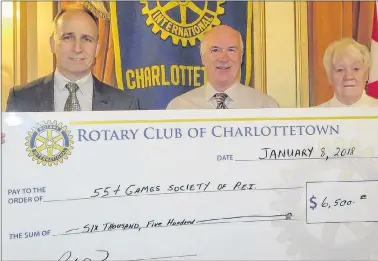  ?? SUBMITTED PHOTO ?? Dhuey Pratt, centre, president of the P.E.I. 55 plus Games Society, accepts a cheque from Paul Crant, president of the Rotary Club of Charlottet­own, and committee member Marilyn Lowther.