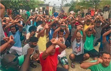  ?? PHOTO: NICK MCKIM/TWITTER ?? Australian Green Senator Nick McKim tweeted this photo of refugees who are refusing to leave the Manus Island detention centre. McKim has labelled Australian Immigratio­n Minister Peter Dutton a ‘‘monster’’ over his handling of the issue.