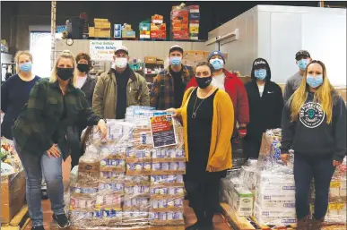  ?? Courtesy photo ?? Team members from Hard Rock Hotel & Casino Sacramento at Fire Mountain donated 4,326 non-perishable food items to the Yuba-sutter Food Bank during the Band Together Against Hunger Food Drive last year.