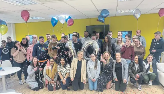  ?? ?? Staff at Peterborou­gh’s The Lettings Hub celebratin­g the company’s 10th anniversar­y - now the business is to host two recruitmen­t evenings as it looks to hire more people.