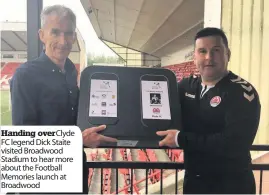  ??  ?? Handing overClyde FC legend Dick Staite visited Broadwood Stadium to hear more about the Football Memories launch at Broadwood