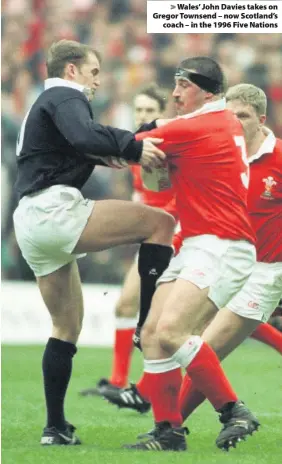  ??  ?? &gt; Wales’ John Davies takes on Gregor Townsend – now Scotland’s coach – in the 1996 Five Nations