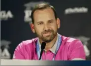  ?? CHUCK BURTON - THE ASSOCIATED PRESS ?? Sergio Garcia smiles as he listens to a question during a news conference on Wednesday before his practice round for the PGA Championsh­ip.