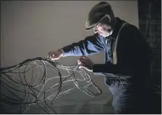  ?? PICTURES: SIMON HULME ?? METAL GURU: Left, above and inset below, sculptor Mark Irwin who makes sculptures out of wire, pictured at his workshop at Pocklingto­n, East Yorkshire; below, the sculpture of Britain’s wartime leader Winston Churchill.