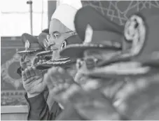  ?? — Reuters photo ?? Rouhani is seen during the ceremony of the National Army Day parade in Tehran, Iran.