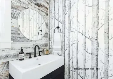  ??  ?? |RIGHT| WOODSY FUN. This powder room features both Stikwood panels and the “Woods” wallpaper from
Cole & Son. Instead of being overbearin­g, the combinatio­n creates a unique and natural black and white aesthetic.