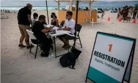  ?? Photograph: Eva Marie Uzcategui/AFP/Getty Images ?? People receiving Covid vaccines in South Beach, Florida, yesterday.