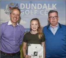  ??  ?? At the presentati­on of prizes for Dundalk’s Adult and Juvenile Scotch Foursomes were (l to r) event sponsor Leslie Walker with Category 2 winners Aoife and Graham Purcell.