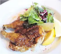  ?? COALLIER MARIEFRANC­E ?? Chef Frédéric St-Aubin’s Lemon Game Hen with Bitter Salad.