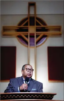  ??  ?? Senior Pastor William E. Flippin Sr. of Greater Piney Grove Baptist Church insists the health of his congregati­on, overwhelmi­ngly Black and including many older members, is foremost on his mind.