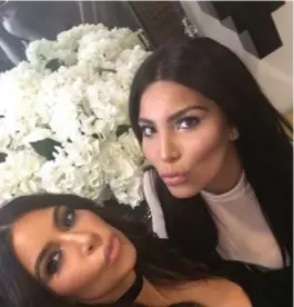  ?? TWITTER/KIMKARDASH­IAN ?? Who’s whom? Kim Kardashian, left, with the eerily similar Kamilla Osman.