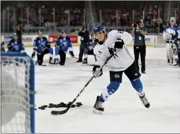  ?? HAYDEN BARBER — THE WICHITA EAGLE VIA AP ?? Profession­al Women’s Hockey Players Associatio­n representa­tive Annie Pankowski competes in the accuracy shot contest at the 2020 ECHL All-Star Classic in Wichita, Kan., Wednesday.