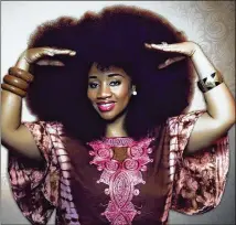  ?? COURTESY OF AEVIN DUGAS ?? Between 2012 and 2019, Aevin Dugas, a social worker from outside of New Orleans, was in the Guinness Book of World Records for having the biggest Afro in the world, about 4 feet 7 inches.