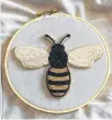  ??  ?? Alex Antle's intricate beaded creations, like this bee, are works of art.