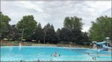  ??  ?? Members enjoy the water at the Aquatic Swim Club in Morton.