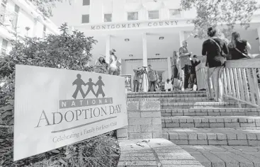  ?? Jason Fochtman / Houston Chronicle file ?? Last month, 26 children were placed with families on Montgomery County Adoption Day. A resolution designatin­g Nov. 15 as adoption day drew fire from social conservati­ves for mentioning “gender identity.”