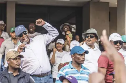  ?? Photo: Marco Longari/afp ?? Victory: Lesotho’s new prime minister and leader of the Revolution for Prosperity party, Sam Matekane, gestures as he addresses supporters in Maseru on 8 October.