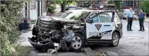 ?? TOM KELLY III–FOR DIGITAL FIRST MEDIA ?? A Pottstown Police SUV was responding to a call when it struck a car, then jumped the curb and hit a tree. Lower Pottsgrove police investigat­ed.
