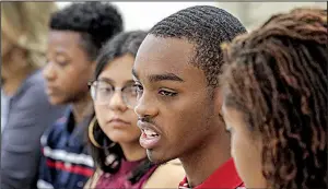  ?? Arkansas Democrat-Gazette/JOHN SYKES JR. ?? Tommy “Chase” Sproles (second from right), 17, a senior at Little Rock’s Central High School, speaks to the governor’s school safety panel Tuesday morning at the Criminal Justice Institute in Little Rock. Others (from left) are Mabelvale Middle School students Durel Shaw and Bryahna Garcia, both 13, and Adaja Cooper, 17, also a senior at Central High School.