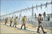  ?? ?? Army personnel deployed at Galadini grid station to restore electricit­y supply for essential services, in Jammu on Monday.