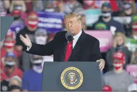  ?? CHARLIE NEIBERGALL — THE ASSOCIATED PRESS ?? President Donald Trump speaks at a campaign rally Wednesday at Des Moines Internatio­nal Airport in Des Moines, Iowa.