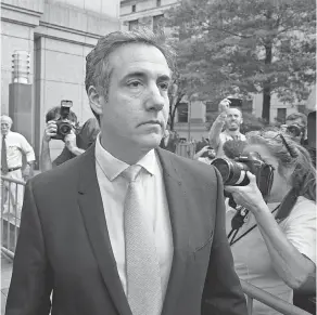  ??  ?? Michael Cohen, former personal lawyer to President Donald Trump, leaves federal court after reaching a plea agreement Tuesday. CRAIG RUTTLE/AP