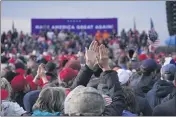  ?? ALEX BRANDON — THE ASSOCIATED PRESS ?? Supporters of President Donald Trump cheer as he speaks during a rally on Saturday in Norton Shores, Mich.