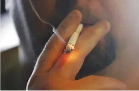  ??  ?? NEW ORLEANS: In this April 21, 2015 file photo, a man smokes a cigarette. —AP