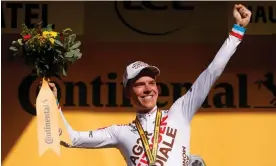  ?? Photograph: Gonzalo Fuentes/Reuters ?? Bob Jungels celebrates after emerging victorious following a 50km attack through the climbs of the Swiss Valaise and Haute Savoie.