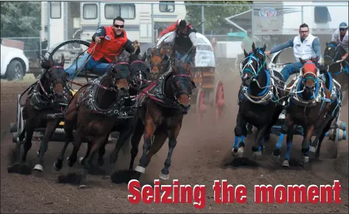  ?? NEWS PHOTO RYAN MCCRACKEN ?? (From left) Kurt Bensmiller, Luke Tournier and Doug Irvine battle for position in the final turn of Sunday's World Profession­al Chuckwagon Associatio­n championsh­ip heat at the Medicine Hat Exhibition and Stampede. Tournier took the victory after...