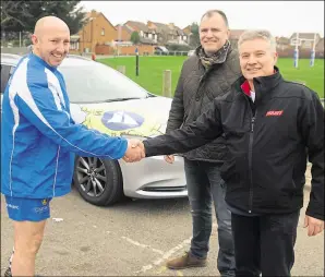  ??  ?? Whitstable playercoac­h Mal Graves has been given a sponsored car by Perrys Mazda. He is pictured left, with club chairman Duncan Mackinnon, centre, and Rick Gaskell, from the car dealership