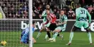  ?? Photograph: Andrew Fosker/Seconds Left/Shuttersto­ck ?? Mathias Jensen scores Brentford’s third goal in the victory.