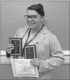  ?? Contribute­d ?? GNTC Floyd student Aixa Rodriguez poses with her awards after the PBL competitio­n.