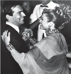  ?? Picture: Getty Images ?? ROYALTY Princess Grace of Monaco and Barnard take a spin at a charity gala of the Monaco Red Cross.